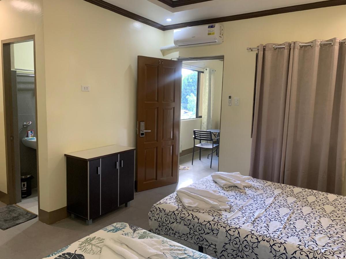 Zl Travelers Inn Batuan Zewnętrze zdjęcie