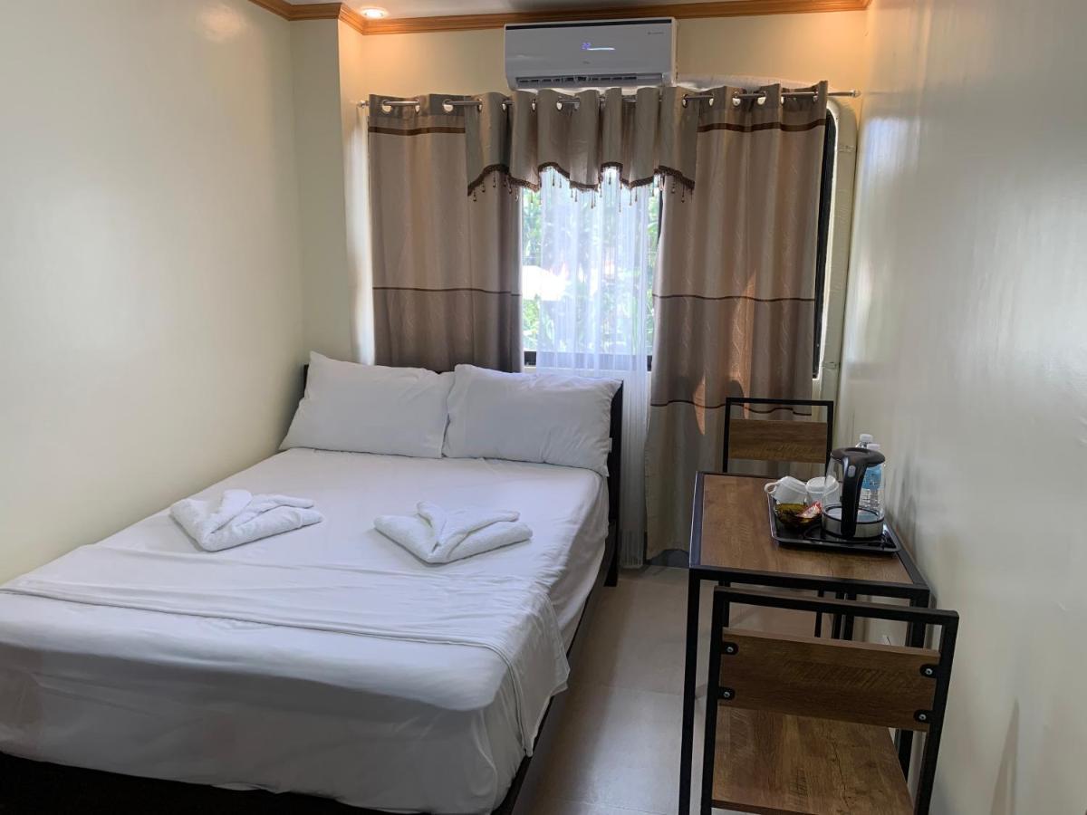 Zl Travelers Inn Batuan Zewnętrze zdjęcie