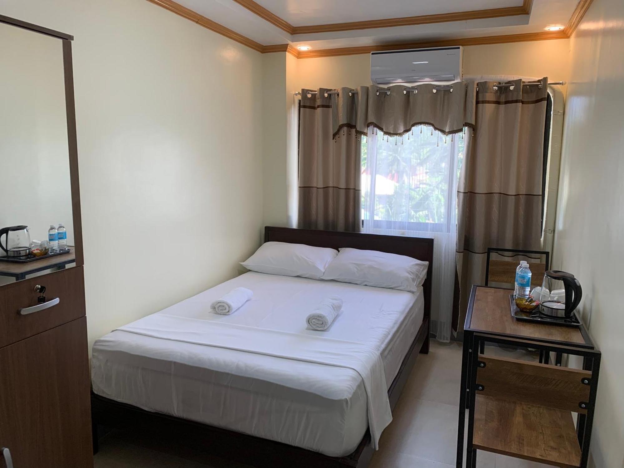 Zl Travelers Inn Batuan Zewnętrze zdjęcie