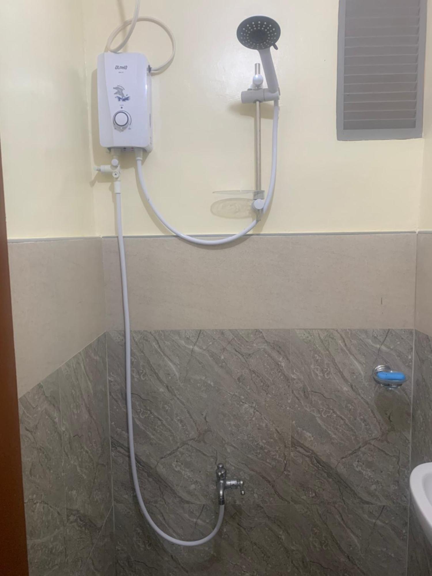 Zl Travelers Inn Batuan Zewnętrze zdjęcie
