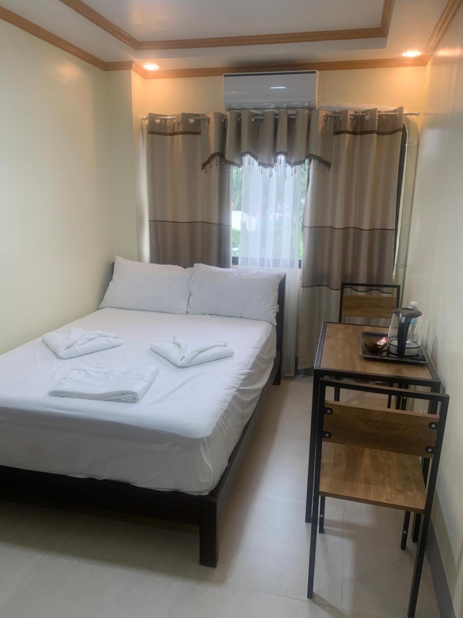 Zl Travelers Inn Batuan Zewnętrze zdjęcie